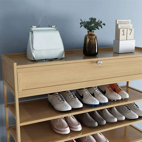 Ten Tier Stackable Shoe Rack With Top Storage Bin Vertical Narrow Shoe Organizer For Entryway Closet Lightweight Yet Heavy Duty with shoes and a bag.