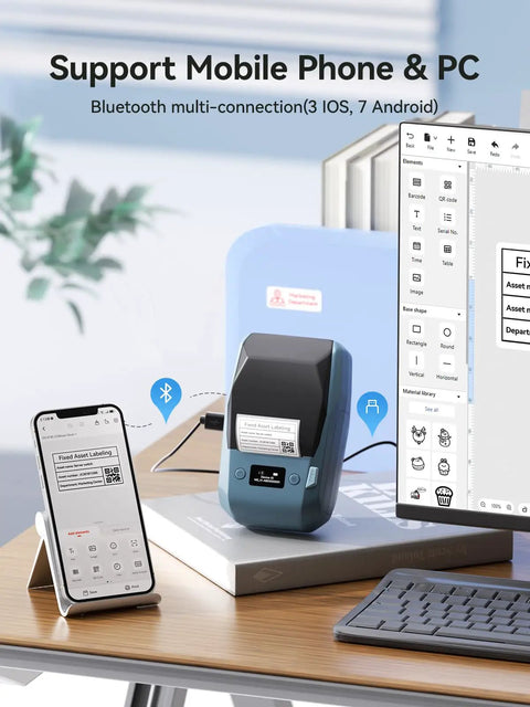 2 Inch Thermal Transfer Bluetooth Label Maker With Color Ribbon Printing For Waterproof Scratch Resistant Labels Ideal For Office Small Business School And Home Phone And PC Compatible Blue displayed on desk with phone and computer