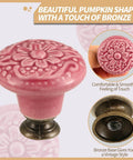 Rose Red Ceramic Flower Cabinet Knobs 10 Pack With Screws Embossed Floral Drawer Handles Kitchen Cupboard Hardware Hits Different Vintage Style Pantry Setup Total Game Changer in pumpkin shape with bronze base.