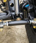 Close-up of Badass Trail Ready 7 8 Inch Left Thread Heim Joint Kit with Chromoly Weld Bung and Jam Nut installed on UTV.