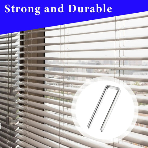 80 Piece Plantation Shutter Repair Kit With Rugged Stainless Steel Louver Staples For Quick Window Treatment Fixes Knock Out Squeaky Blinds Without The Headache And Keep Your Home Running Like New Every Day - Close-up of stainless steel louver staple against window blinds.