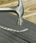 Pro Grade Honey Grove Replacement Plugs For Cortex Fastening System 80 Pack being installed with a hammer on decking surface.