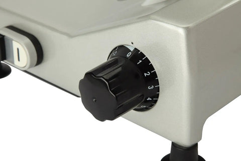 Knockout 240 Watt 10 Inch Electric Deli Slicer control knob for adjusting thickness, durable design, secure operation, kitchen tool.