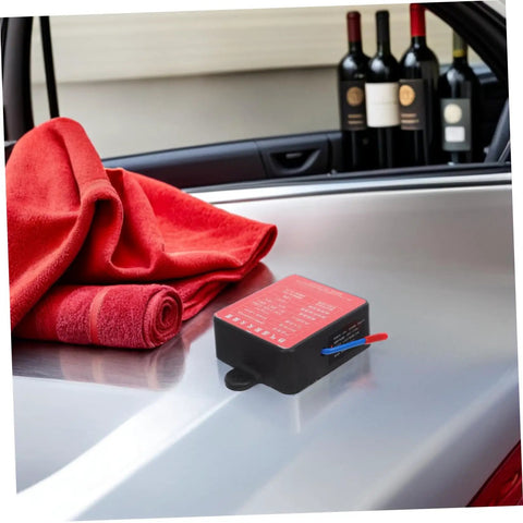 No Sweat Auto Rescue 30G Fire Extinguisher With Super Sticky Back Adhesive For Sedans Trucks And Trailers on car surface beside red towel.