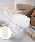 EPE Foam Packing Bags With Bubble Cushioning Wrap For Electronics And Fragile Items beside packaging materials on a table