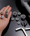 12 Pack Small U Groove Ball Bearing Pulleys 4X13X7MM Miniature V Wheel Rollers on hand and table top, showing size and design.