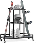 Floor Standing Ski And Snowboard Rack With 3 Tier Shelf Holds Boots Helmets And Packs Drill Free Mount No Sweat Setup with skis and snowboards.