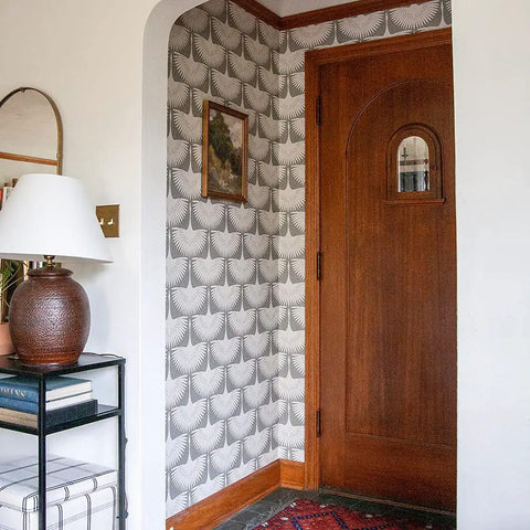 Chalk Feather Flock Peel And Stick Wallpaper Two Pack 20.5 Inches By 16.5 Feet Light Gray And Off White Made In The USA Genevieve Gorder Collab displayed in a stylish entryway
