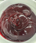 Close-up view of Red High Temp Grade Two Lithium Complex Multi Purpose Grease in a 35 pound pail for wheel bearings and chassis.