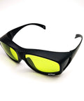 Heavy Duty Laser Safety Glasses Delivering Full Coverage Broad Spectrum Eye Protection For Uv To Far Infrared Range CE En207, black frame, yellow lenses.