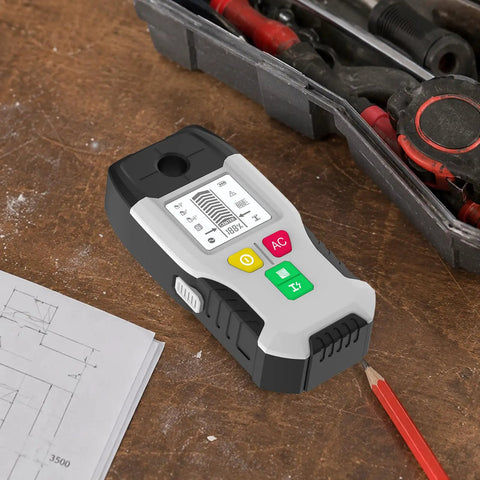 Close-up of 6-in-1 Stud Finder Wall Scanner Metal Detector LCD Display(Grey) on wood table with tools and blueprints.