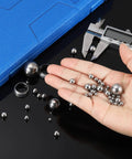 Rugged 18Mm Bearing Balls With Mirror Polish Finish 5Pcs 304 Stainless Steel Precision G100 Grade Spheres in hand with caliper.