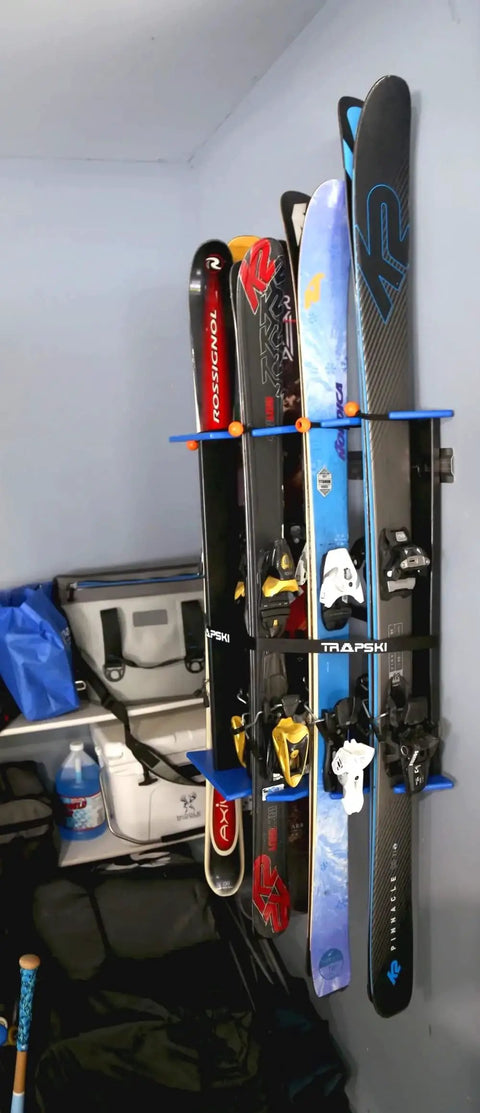 Heavy Duty Wall Mounted Ski And Snowboard Storage Rack Constructed From Durable Aluminum Frame with skis secured and organized.