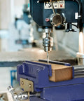 Rock Solid Cross Slide Drill Press Vise Featuring Six Inch Jaw Opening And Smooth Xy Slides For Hassle Free Benchtop Milling Woodworking And Garage Project Builds with wood piece.