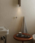 Sweet Looking Pebble Wall Hook Built From Top Shelf 304 Stainless Steel Keeps Your Everyday Essentials Off The Floor in bathroom setting.