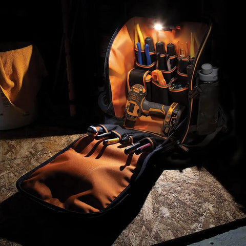 Heavy Duty Jobsite Ready Workhorse Tool Backpack with open orange interior and tools under light, showcasing organization