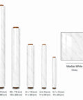 Different sizes of marble look peel and stick contact paper in rolls, including 39 inch by 118 inch white vinyl wallpaper.
