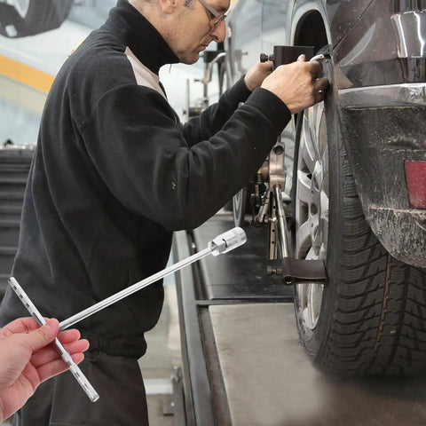 T Handle Socket Wrench Set with Serious Grip for Lug Nuts and Auto Repairs in use during vehicle maintenance.