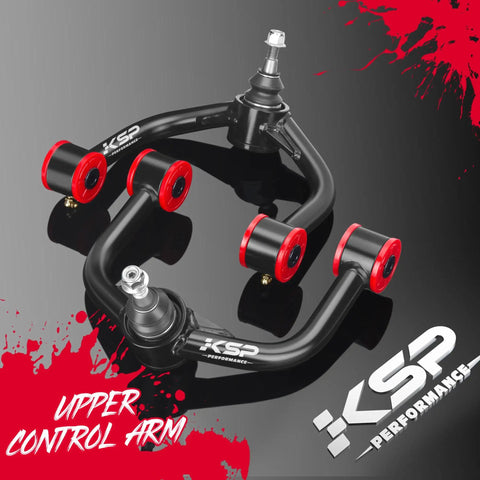 Badass Two To Four Inch Lift Upper Control Arms Kit For Jeep Grand Cherokee WK 2005 2010 And Commander XK featuring black alloy with red bushings.