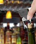 Using corkscrew on Six In One Folding Grill Utensils Set Featuring Fork Spatula Knife Tongs Bottle Opener And Corkscrew For Fourteen Inch Portable