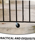 Heavy Duty Silent Gate Support Wheel With Adjustable Height Design And Tough As Nails Build For Dead Quiet Glide and Breezy Door Operation Every Time visible under a black gate.