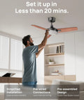 Man installing Smart Ceiling Fan With Lights, 42 Inch Black, 12 Speeds, 3 Modes, Stepless Color Tones, Dimmable LED Light