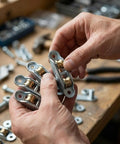 User examining Built Tough Complete Set Double Wheel Push And Pull Window Pulley with rust resistant screws.