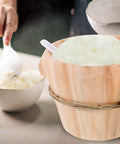 Kickin Flavor Infusion Starts With This Handmade Wooden Rice Steamer Bucket And Tight Fitting Lid Built On A Heavy Duty Stable Base Along With Heat Safe Handles For Daily Meal Prep with fluffy rice.