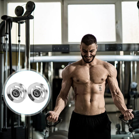 Person using Heavy Duty Replaceable Cable Pulley Wheels 10 Pack Smooth As Butter Aluminum Alloy Lifting Blocks in gym.