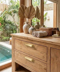 Ten Pack Gold Cup Pulls Three Inch Center To Center Cabinet And Drawer Handles For Kitchen Hardware featuring gold handles on wooden dresser.