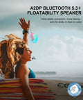 Woman holding a floating Shower Bluetooth Speaker Waterproof IPX7 with LED Light, suitable for poolside use, travel, and beach.