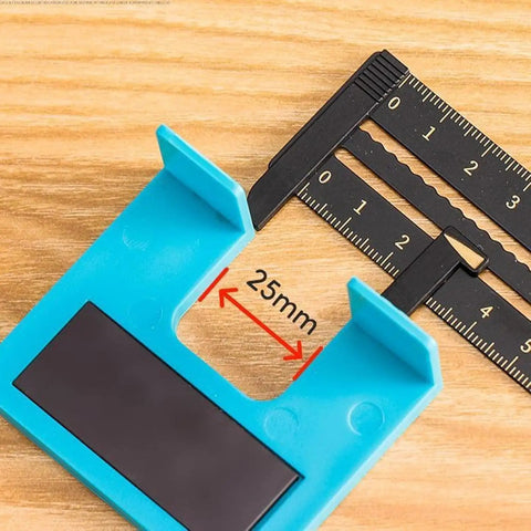 Close-up of a Magnetic Door Hinge Jig Kit For Quick Installations No Drill Mortise Tool with a 25mm measuring guide, blue plastic component.