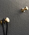 Slick Wall Mounted Tea Towel Hooks Built Tough 304 Stainless Steel Rustproof Robe And Coat Hangers for wall with braided black rope.
