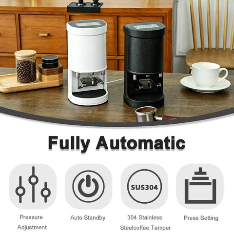 58mm Electronic Coffee Tamper Automatic Grounds Press Featuring Adjustable 5 To 30 Kilogram Force And Customizable Tamp Cycles in black and white on a kitchen table.