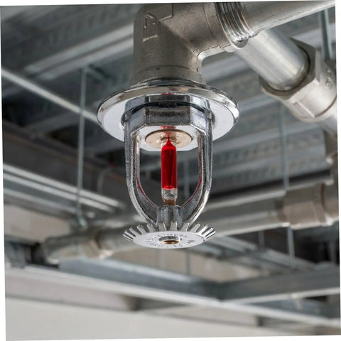 10 Pack Copper Fire Sprinkler Heads 155 Degree Activation Half Inch Thread Vertical Spray detailed view of a working sprinkler head