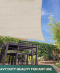 Rugged Cotton Duck Drop Cloth for Painting and Protection, heavy-duty canvas tarp used as sunshade over outdoor furniture in garden.