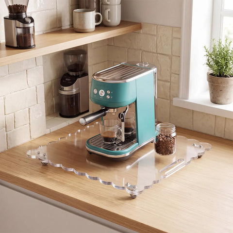 Slick Acrylic Appliance Slider With Swivel Casters And Wavy Scalloped Trim For Easy Kitchen Counter Sliding Heavy Duty Rolling Cart holding a coffee machine.