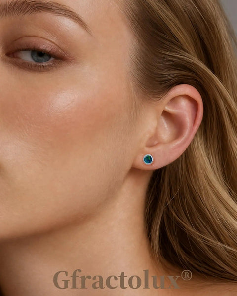 Woman wearing Implant Grade G23 Titanium Opal Earrings Screwback Studs with 5mm sharp centerpiece, showcasing style and comfort.