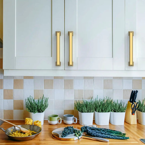 Slick Brushed Brass Cabinet Handles For Kitchen Upgrade Set Of Ten 5 Inch Heavy Duty Metal Pulls with plants and kitchenware