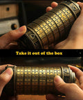 Hands holding Da Vinci Code Inspired Mini Cryptex Lock Puzzle Box With Hidden Compartments, showing brass dials.