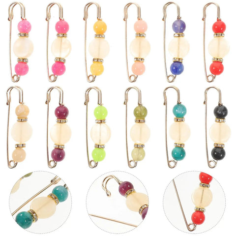 12 Piece Heavy Duty Alloy Waist Adjustment Pins To Fix Baggy Jeans And Bulkier Sweaters Metal Safety Brooch Clips in various colors.