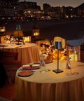 Rechargeable Cordless LED Table Lamp With 5200mAh Battery, All Aluminum Body, IP54 Waterproof, Warm Light on outdoor dining table at night