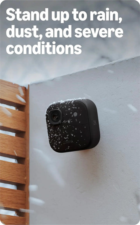 Outdoor 2K Plus Wireless Smart Security Camera with Sharp 2K Video, installed on wall, weather-resistant, snow-covered