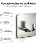Rock Solid Self Adhesive Wall Hooks Crafted From Premium Stainless Steel For Zero Drill Wall Mounting And Effortless Home Organization With A Smooth Silver Look Set Of Four on smooth surface.
