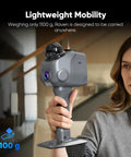 Handheld LiDAR Scanner With Embedded 4K Camera For Seamless 3D Scanning And Architectural Drafting Featuring Killer Precision And Zero Hassle Setup For Foremen And Contractors Who Need Rapid Field Results Daily held by a woman, showcasing its lightweight design of 1100g.