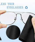 Microfiber cleaning cloth for glasses, black; shown wiping metal-frame eyeglasses.