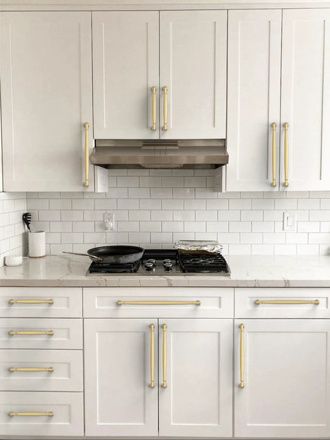 Straight Fire Brushed Gold Cabinet Pulls 10 Pack Set 5 Inch Center To Center Kitchen Drawer Handles on white cabinetry.