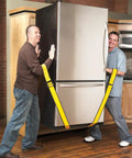 Two men using Badass Forearm Moving Straps to lift a refrigerator, showing heavy duty adjustable yellow straps for easy moving.