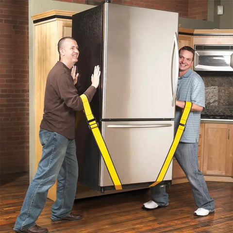 Two men using Badass Forearm Moving Straps to lift a refrigerator, showing heavy duty adjustable yellow straps for easy moving.