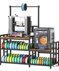 Heavy Duty 3D Printer Desk With Knockout Filament Storage Rack And Plug And Play Power Outlet, Dual Print Station For Abs Pla Tpu Spools, Boss Level Organization For Streamlined Workflows, Sturdy Wood Cabinet Setup In Classic Retro Brown, showing dual print stations with colorful spools.